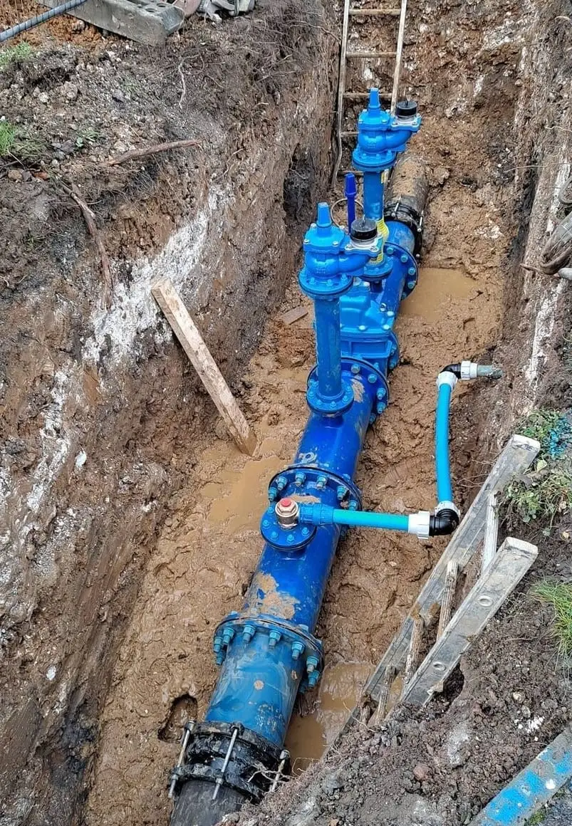 Large gate valves installed in a water main chamber on a London scheme