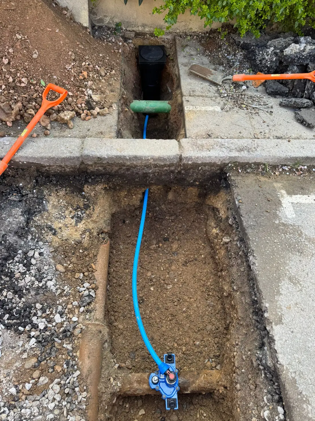 New water service connection installed in the footway outside a property