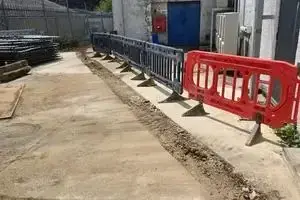 Reinstated route alongside the building after the mains lay